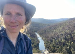 Rachael Bartlett, one of Wildlife Unlimited's amazing Senior Ecologists and Program Managers at a river lookout